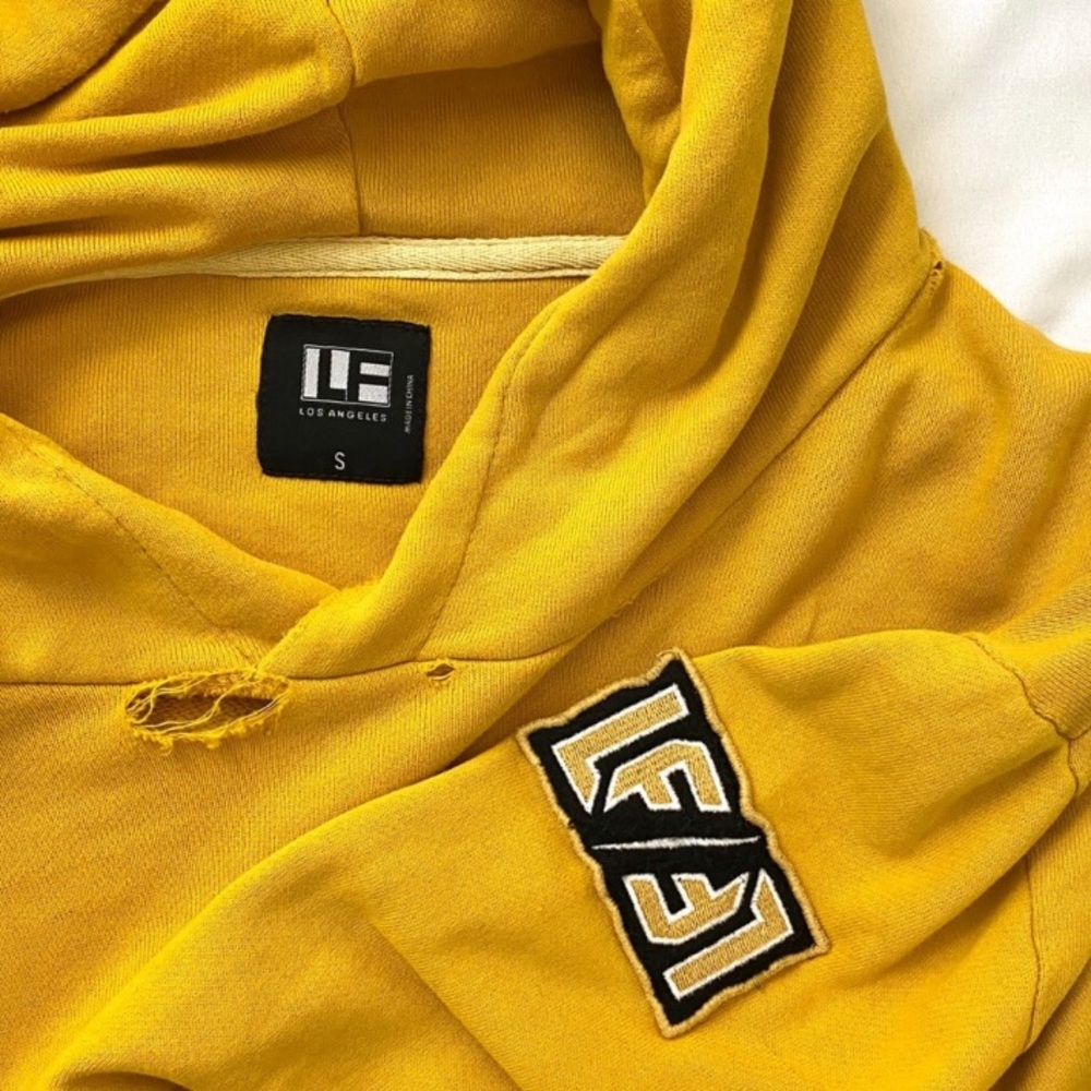 LF distressed yellow hoodie